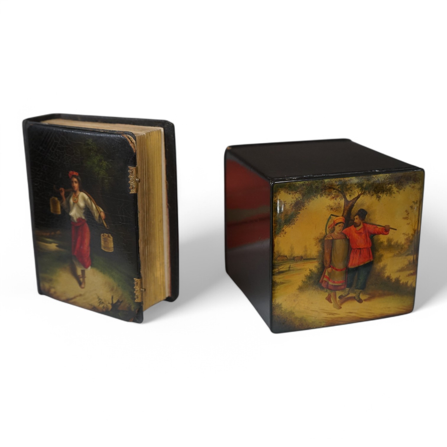 A late 19th / early 20th century Russian lacquer tea caddy and photograph album, largest 16cm high. Condition - fair/good